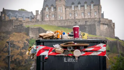 Overflowing bin in front of Edinburgh Castle