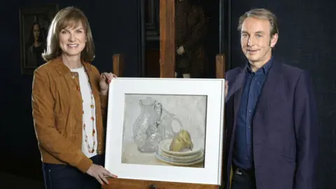BBC Studios Philip Mould and Fiona Bruce with the painting
