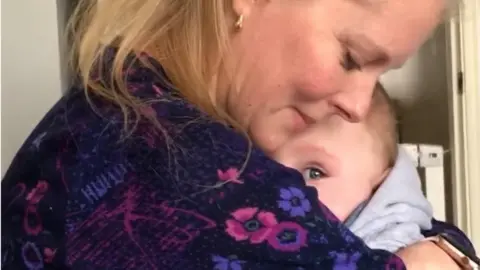 Family photo Amber and her baby daughter