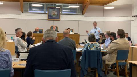 Richard Stanley standing up and talking at Tewkesbury Borough Council's meeting