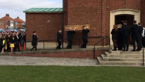 BBC Charlie Pope's coffin being carried into church