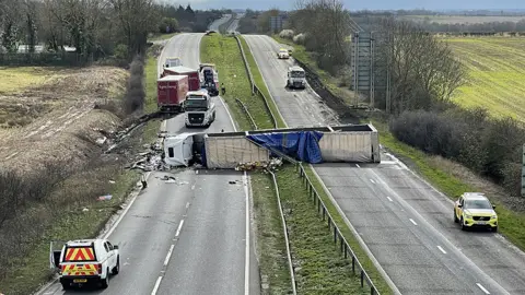 Harry Parkhill/BBC Lorry overturned on carriageway