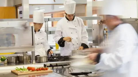 Getty Images chefs in kitchen