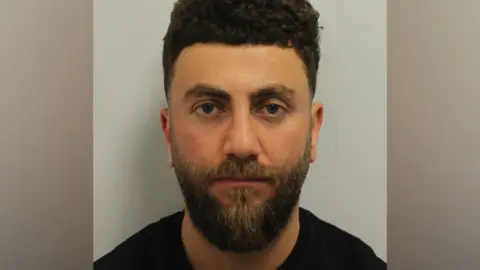 NCA handout/PA Photo Hewa Rahimpur's arrest in 2022 led to a police operation against his gang in several European countries