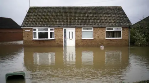 PA Media Flooded home in Fishlake