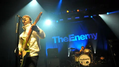 Getty Images The Enemy on stage