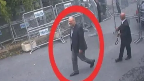 Reuters A still image taken from CCTV video and obtained by TRT World claims to show Saudi journalist Jamal Khashoggi, highlighted in a red circle by the source, as he arrives at the Saudi Arabian consulate in Istanbul, Turkey on 2 October 2018