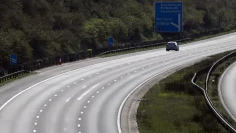 PA Media Car on an almost deserted motorway