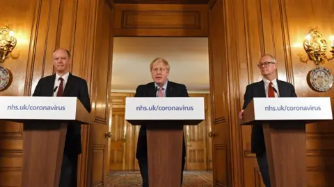 EPA Boris Johnson, Patrick Vallance and Chris Whitty at a news conference