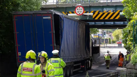 A lorry trapped under a bridge on Balgreen Road in Edinburgh