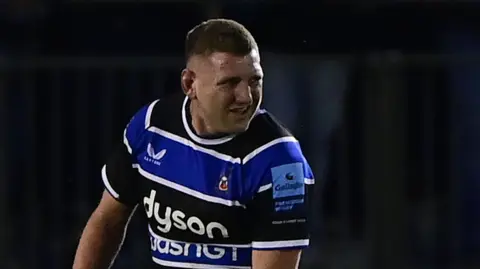 Finn Russell walks off with cramp near the end of Bath's Premiership final win over Bristol