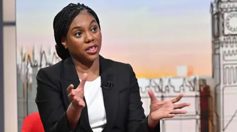 BBC Conservative Leader Kemi Badenoch wears a black blazer and white shirt on BBC One's Sunday with Laura Kuenssberg