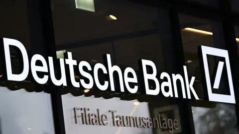Deutsche Bank sign on one of its offices