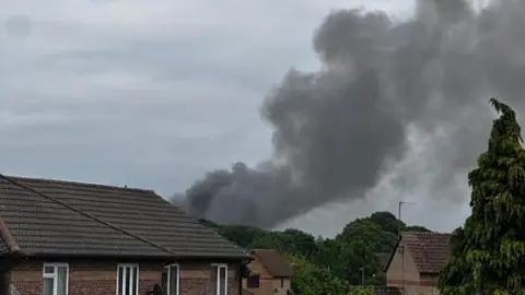 Plumes of smoke can be seen in the Bicester sky