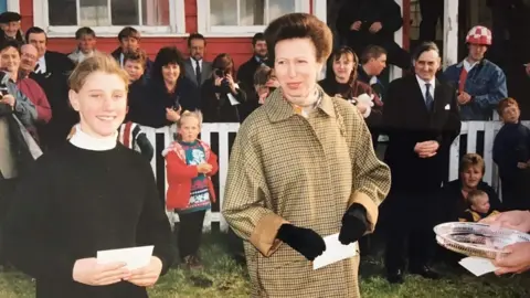 Sara Halford Sara Halford being presented first place by Princess Anne after winning the Pegasus Cup in Feb 1996 in Stanley