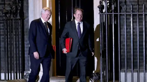 Getty Images David Davis and Liam Fox leave Number 10