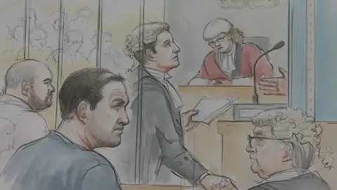 Helen Tipper Terence Whall in the dark jumper