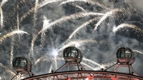 PA Media Fireworks next to the London Eye