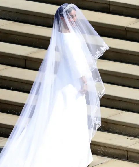 PA Meghan Markle arrives for the wedding ceremony to marry Prince Harry at St George"s Chapel, Windsor Castle