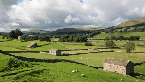 R A Kearton/Getty Barns in the Yorkshire Dales