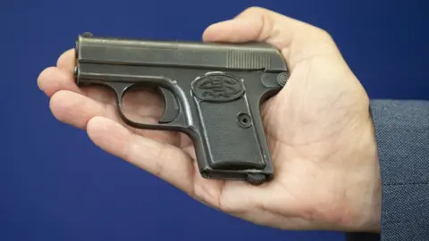 PA Media The murder weapon was an antique German pistol