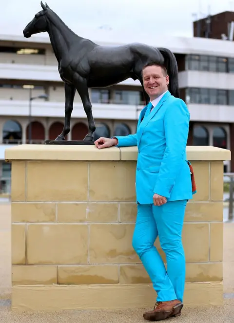 PA A racegoer during Ladies Day of the 2019 Cheltenham Festival