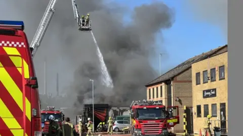 Richard Smith/BBC Firefighters tackling blaze at sausage factory