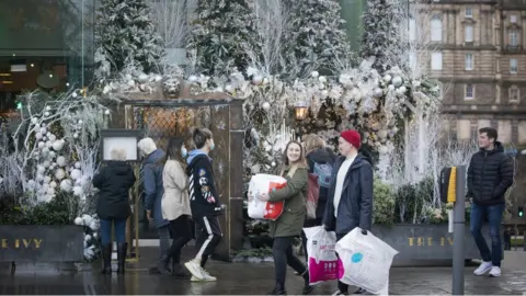 PA Media Christmas shoppers