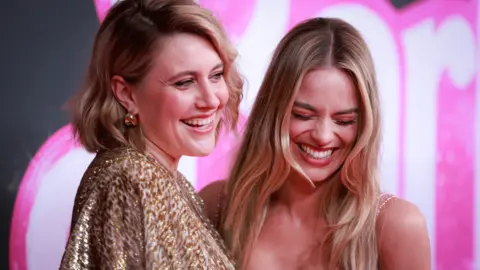 Getty Images Greta Gerwig and Margot Robbie attend the "Barbie" Celebration Party at Museum of Contemporary Art on June 30, 2023 in Sydney, Australia. "Barbie", directed by Greta Gerwig, stars Margot Robbie, America Ferrera and Issa Rae, and will be released in Australia on July 20 this year