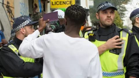 Getty Images Police in a crowd