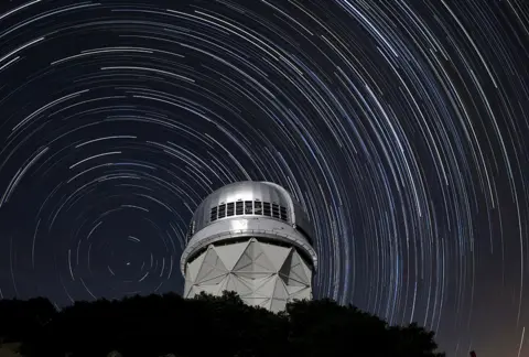 KPNO/NOIRLab/NSF/AURA/P.Marenfeld Star trails over the Nicholas U Mayall 4-meter Telescope on Kitt Peak National Observatory near Tucson, Arizona