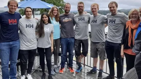 Dr Danny Longman Dr Longman with his support team