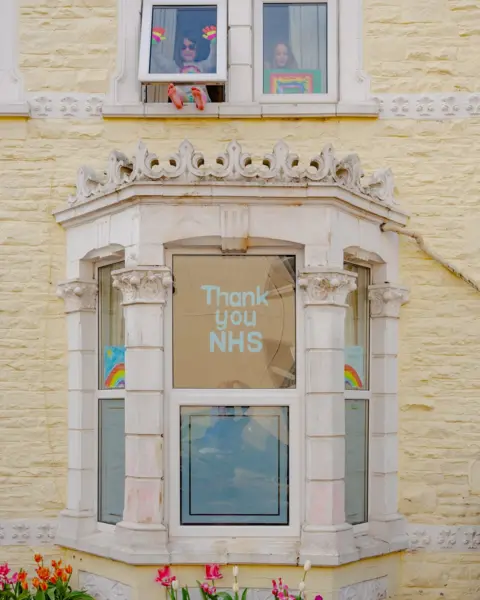Tom Skipp Ella and Alix at the window