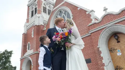 Pacemaker Paddy and Rebecca Smyth finally tied the knot on the fourth attempt at Cregagh Presbyterian church in east Belfast