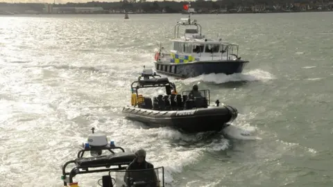 Thames Valley Police Three police boats on the water