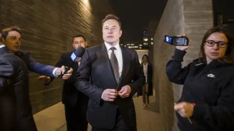 Getty Images Elon Musk leaving court in LA