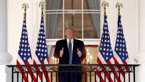 Getty Images President Trump on the White House balcony