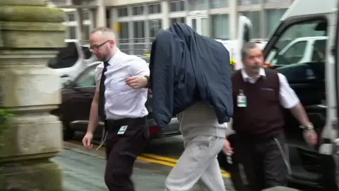 BBC Ben Cooke arriving at court
