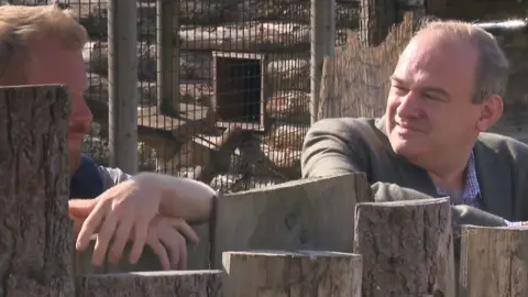 BBC Ed Davy talking to a zoo employee