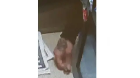 Metropolitan Police Jon Tomlin hand tattoo