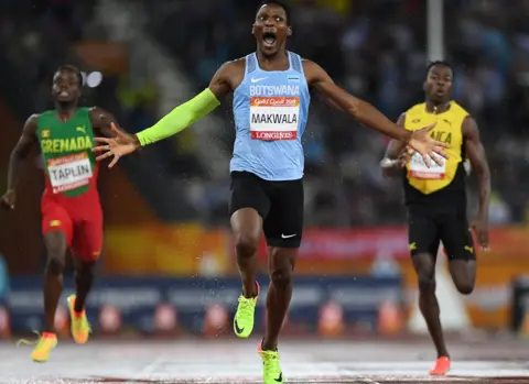 AFP Botswanas Isaac Makwala(C) reacts as he crosses the finish line to win the athletics men's 400m final during the 2018 Gold Coast Commonwealth Games at the Carrara Stadium on the Gold Coast on April 10, 2018.