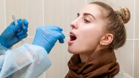 Getty Images Woman being tested