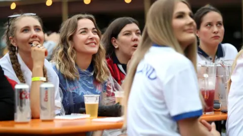 PA Media Football fans