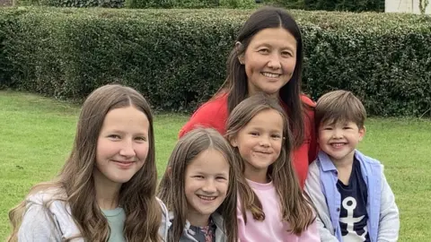 Mum Nicola Chan Gizzi with (from L to R) Anna-Beth, Maia, Lara and Will