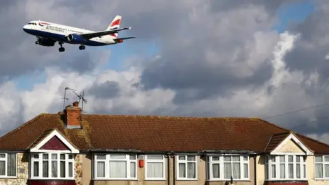 Reuters A British Airways aircraft comes in to land at Heathrow Airport