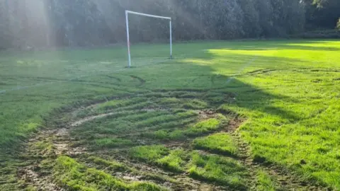 Emma Blount Tyre tracks on football pitch
