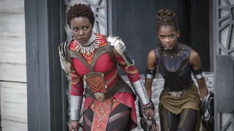 Marvel/Disney Lupita Nyong'o and Letitia Wright in Black Panther