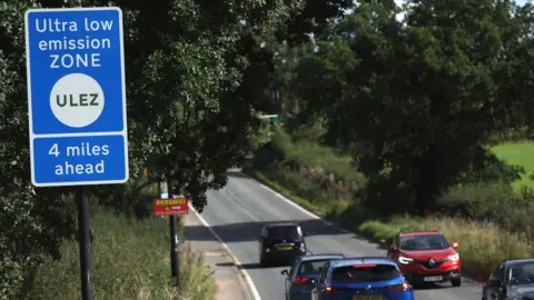 EPA A sign announces the boundary for the Ultra Low Emission Zone (ULEZ)