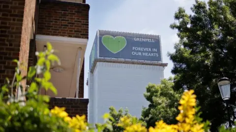 Getty Images Grenfell Tower is pictured in west London on June 14, 2021, four years after a fire in the residential tower block killed 72 people.