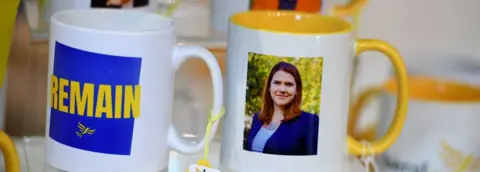 Getty Images Mugs at the Lib Dem conference